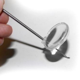 Coglilarva in acciaio inox con lente d'ingrandimento